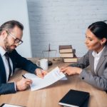 Title Lawyer with client in Long Island, NY